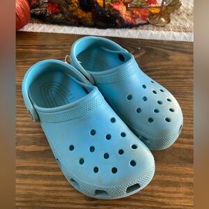 Teal Crocs
